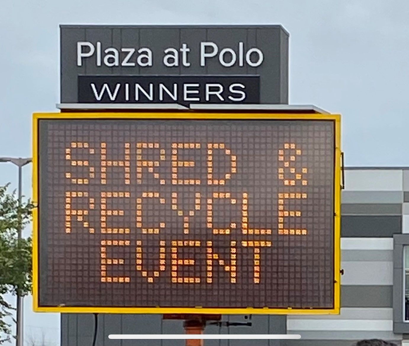 Roadside sign for a community shred and recycle event